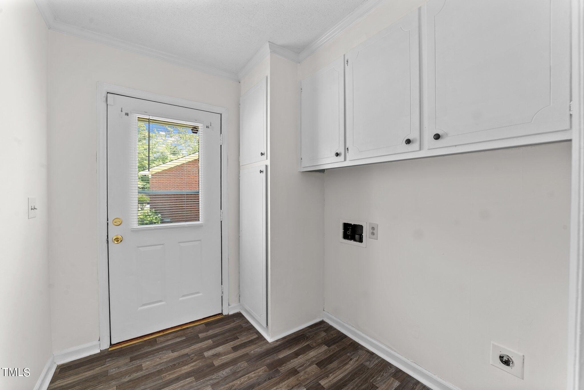207 Freestone Road Greenville, NC 27834 - Photo 19 of 45 a view of storage and utility room with wooden floor