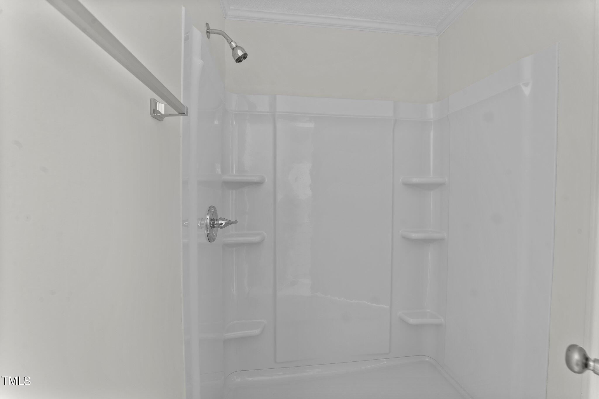 207 Freestone Road Greenville, NC 27834 - Photo 25 of 45 a bathroom with a glass shower door