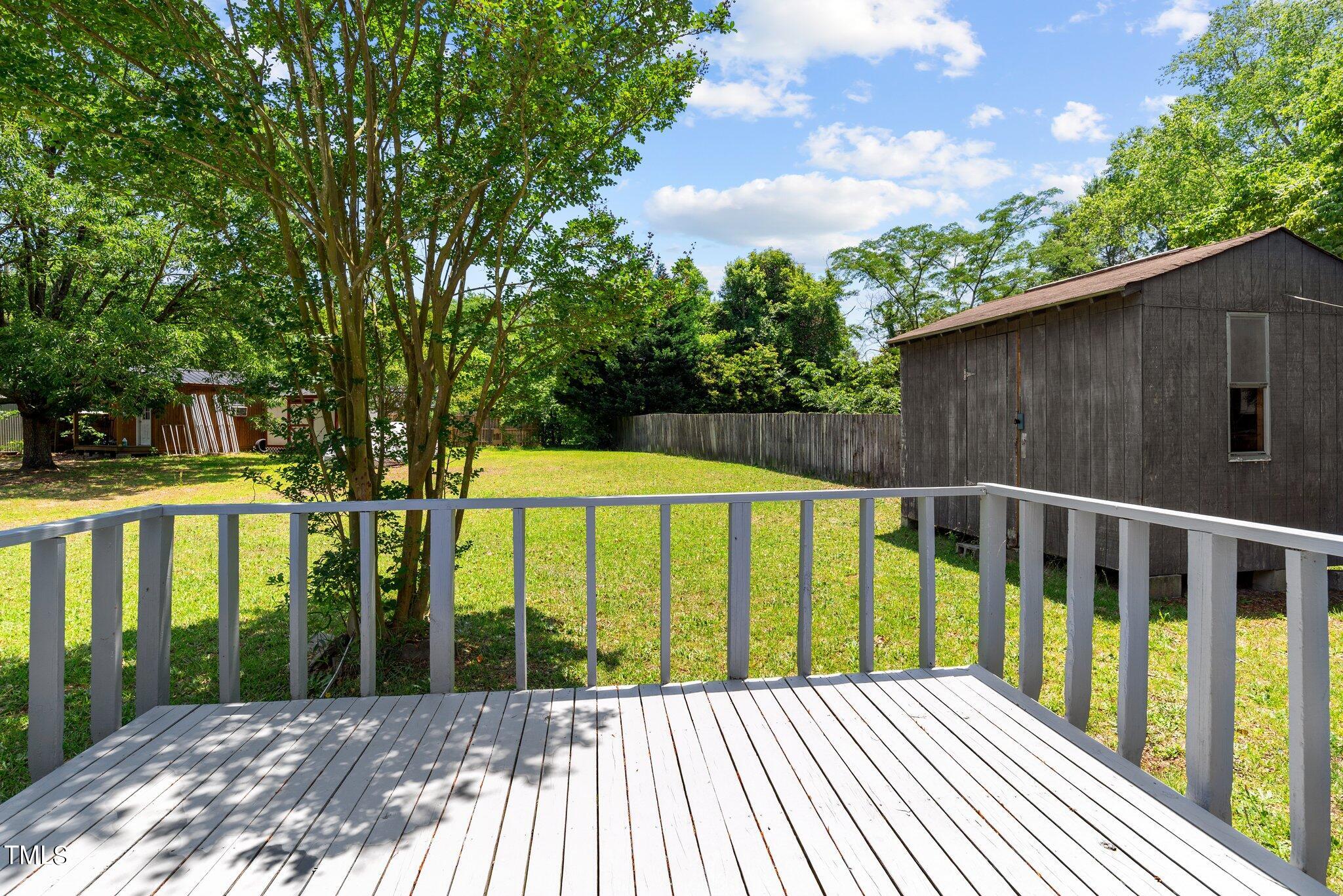 207 Freestone Road Greenville, NC 27834 - Photo 38 of 45 a view of a wooden deck