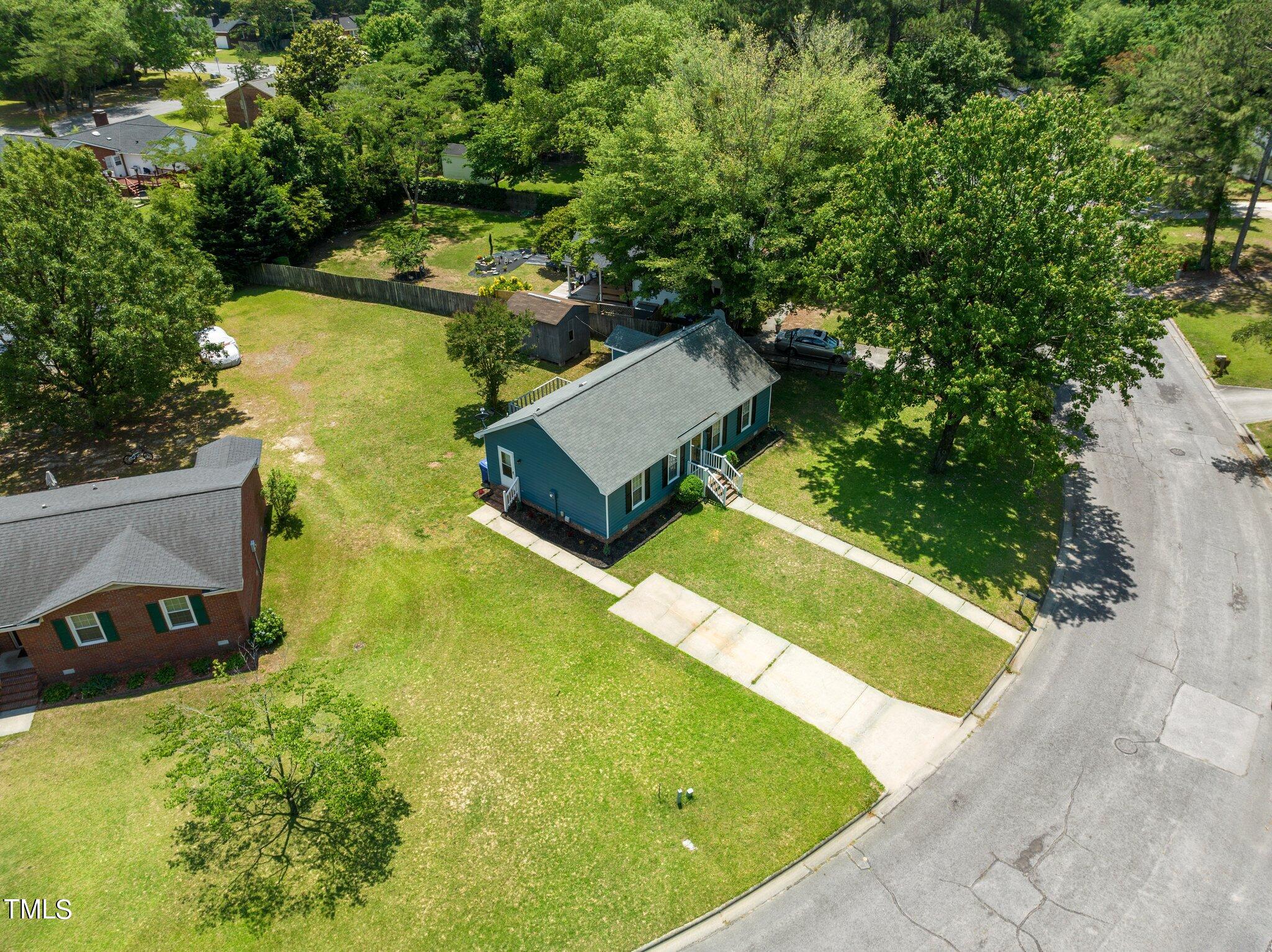 207 Freestone Road Greenville, NC 27834 - Photo 39 of 45 a view of a yard with large trees