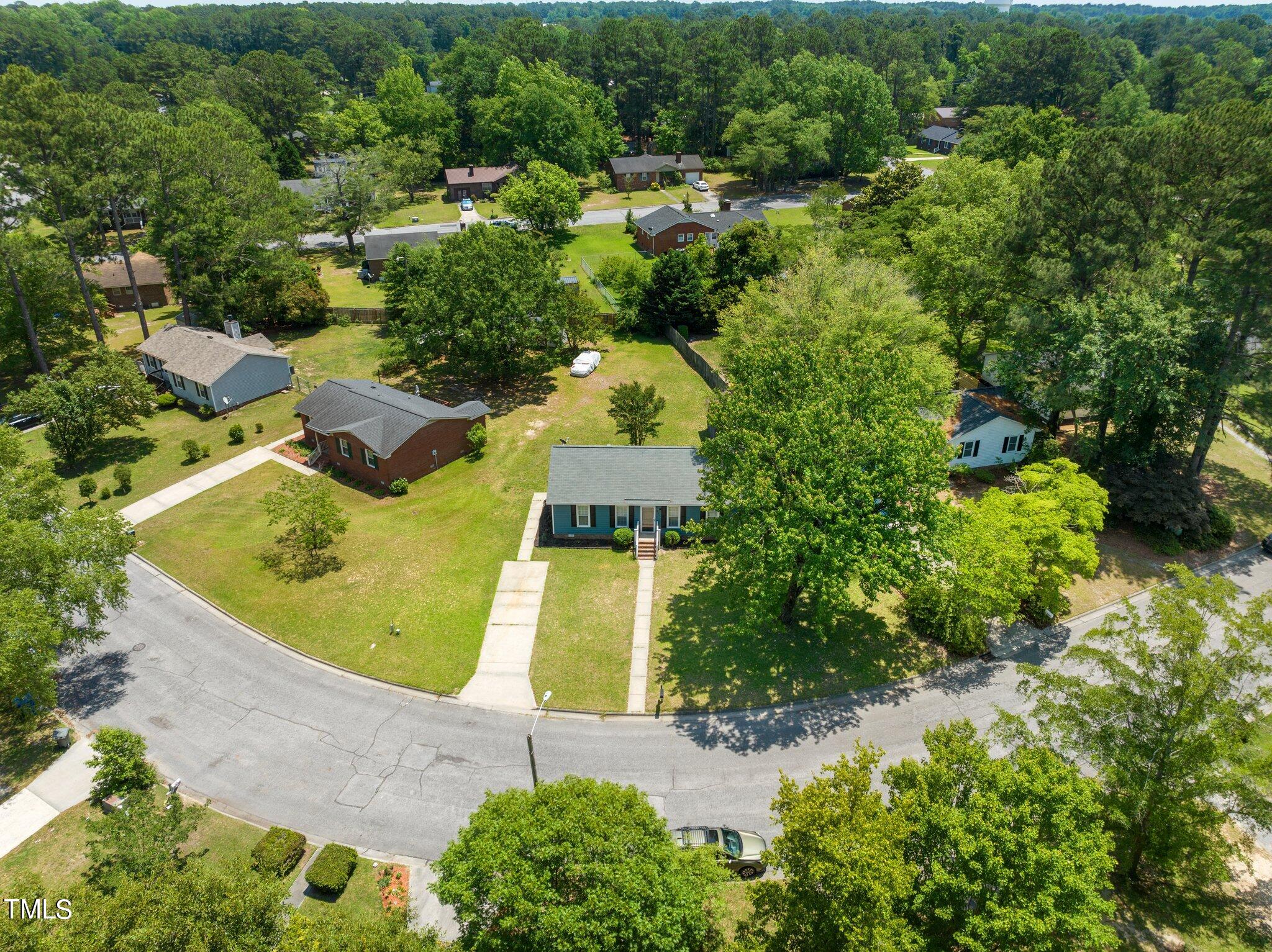 207 Freestone Road Greenville, NC 27834 - Photo 40 of 45 an aerial view of a house with a swimming pool