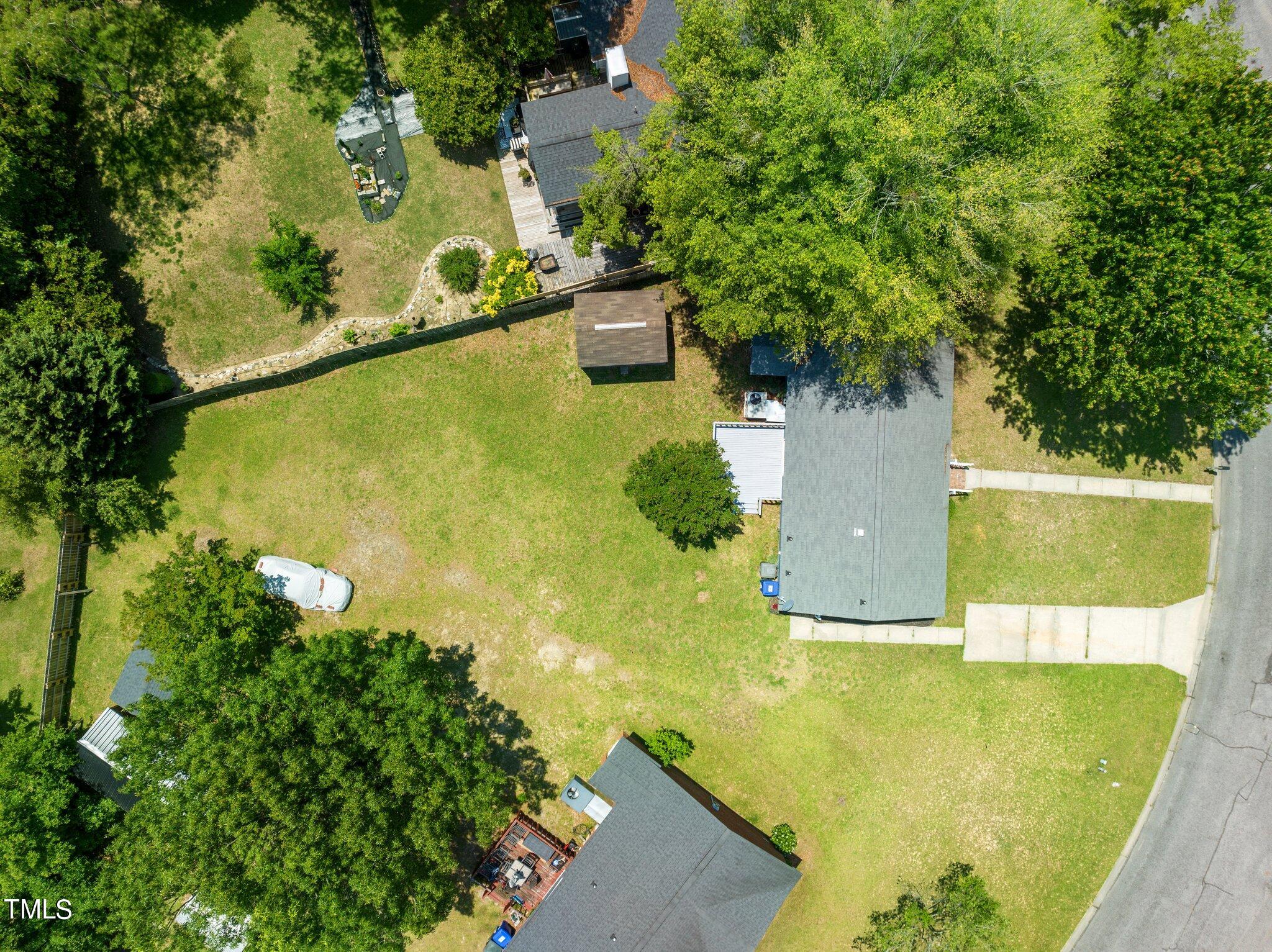 207 Freestone Road Greenville, NC 27834 - Photo 42 of 45 an aerial view of a residential houses with outdoor space and trees all around