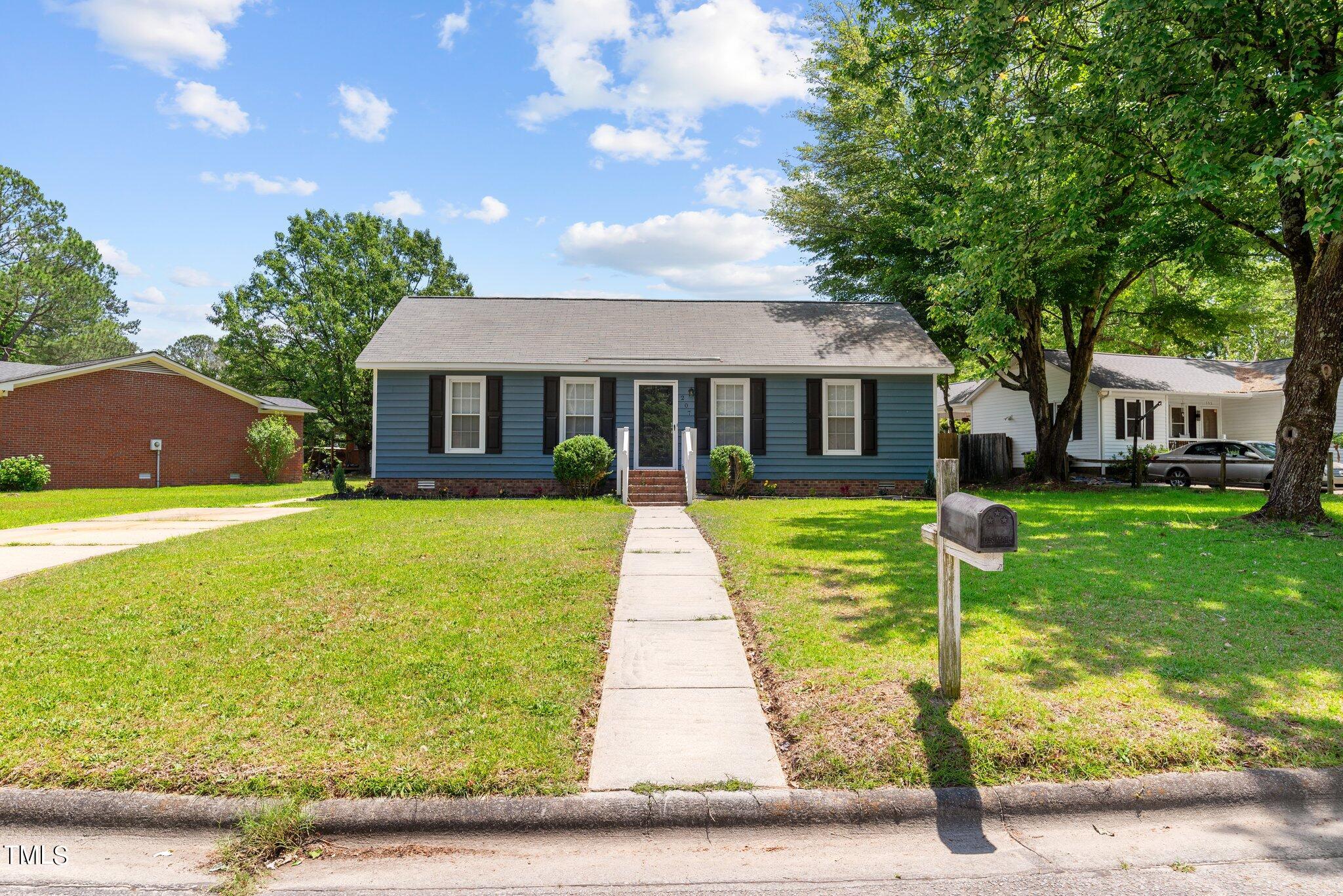 207 Freestone Road Greenville, NC 27834 - Photo 6 of 45 a view of house with a yard