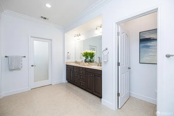 a bathroom with a tub and a shower