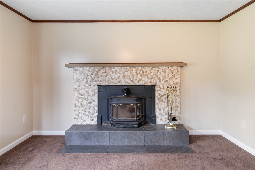 25 Spring Tree Lane Greece, NY 14612 - Photo 12 of 40 The WOOD INSERT fireplace adds extra value with th