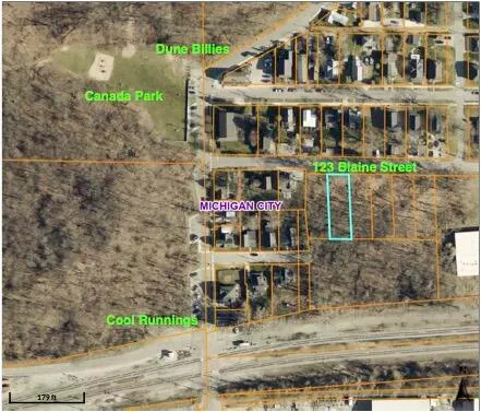 a building with glass top table and chairs