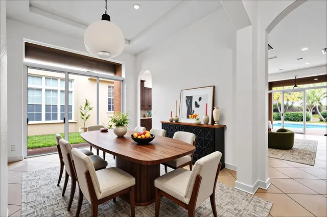 a spacious bedroom with a bed and a couch