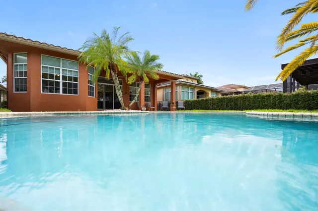 a view of a park with swings and slides
