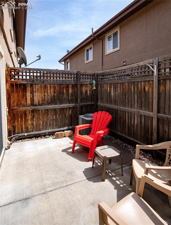 1510 York Road, Unit 103 Colorado Springs, CO 80918 - Photo 13 of 28 a roof deck with table and chairs