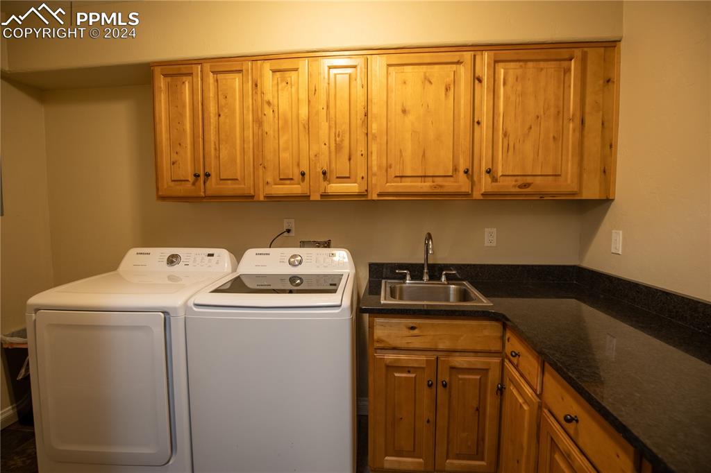1510 York Road, Unit 103 Colorado Springs, CO 80918 - Photo 19 of 28 a utility room with dryer and washer