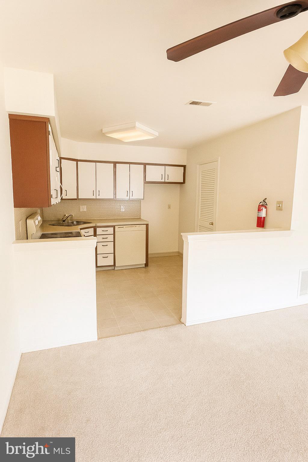 1 Windsor Court Sewell, NJ 08080 - Photo 12 of 21 a kitchen with stainless steel appliances a sink and cabinets