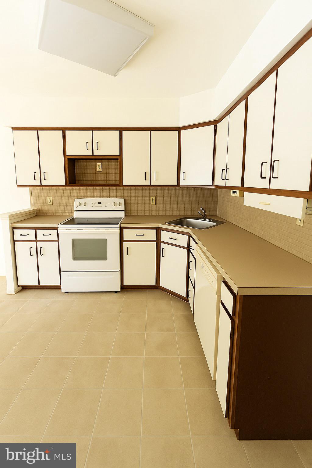 1 Windsor Court Sewell, NJ 08080 - Photo 13 of 21 a view of a kitchen with stainless steel appliances granite countertop a sink and cabinets