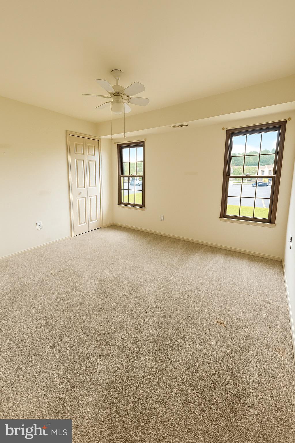 1 Windsor Court Sewell, NJ 08080 - Photo 16 of 21 an empty room with windows and entrance