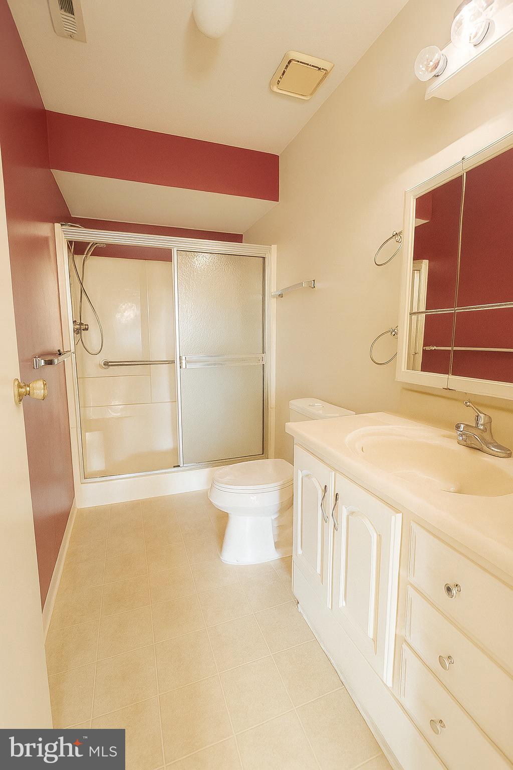 1 Windsor Court Sewell, NJ 08080 - Photo 21 of 21 a bathroom with a granite countertop sink and a shower