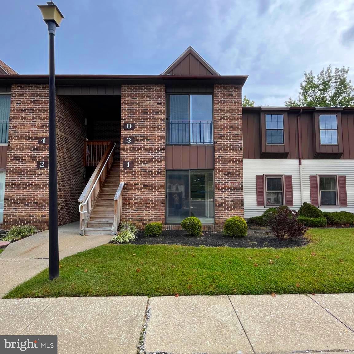 1 Windsor Court Sewell, NJ 08080 - Photo 3 of 21 a front view of a house with a yard