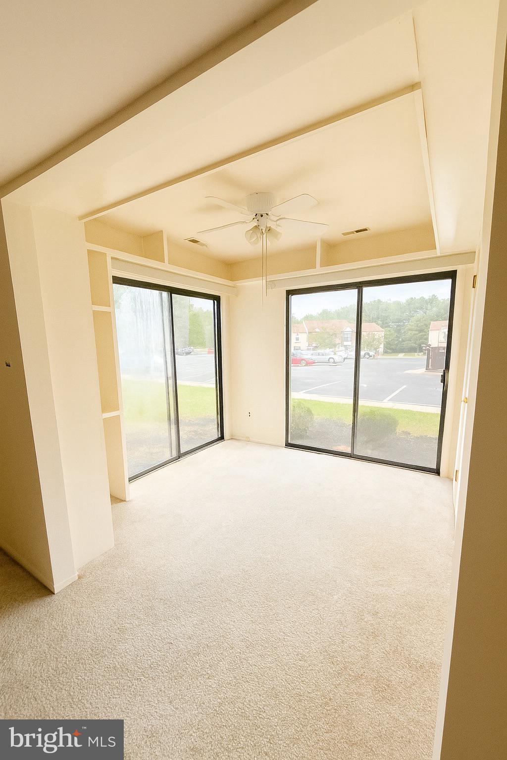 1 Windsor Court Sewell, NJ 08080 - Photo 8 of 21 a view of an empty room with a window