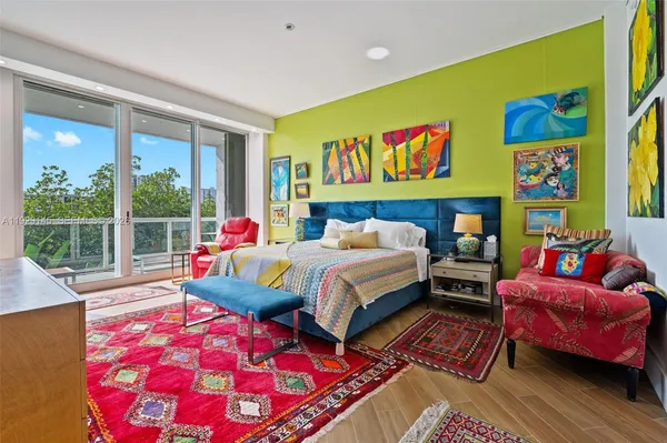 a living room with furniture and flat screen tv