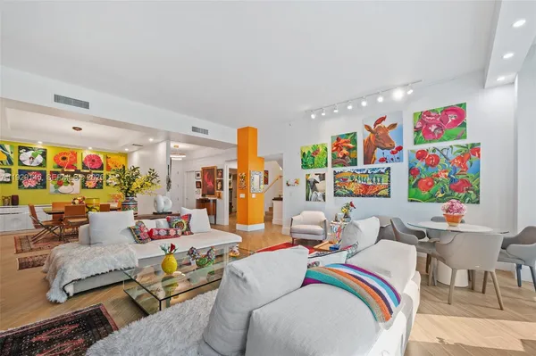 a living room filled with furniture and a couch