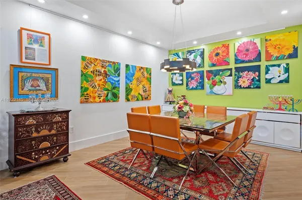 a kitchen that has a lot of cabinets a sink and a stove in it