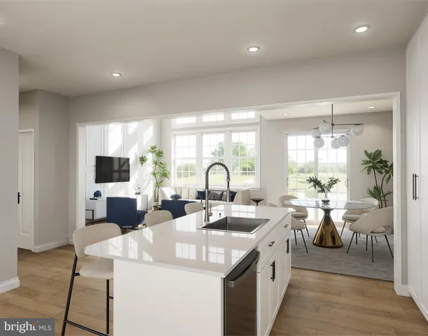 a large white kitchen with a large window