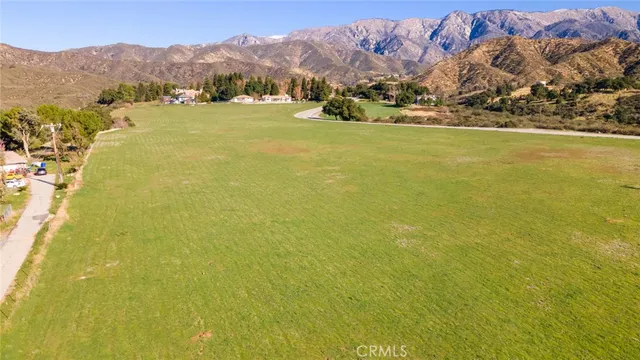 a view of an ocean from a mountain