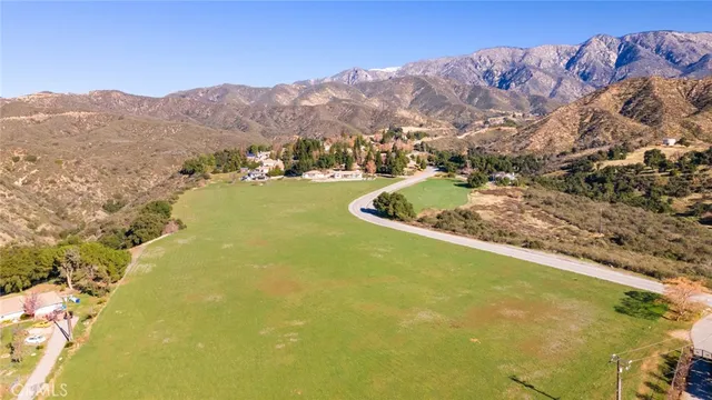 a view of a lake with mountains in the background