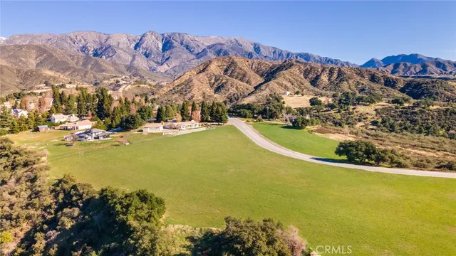 a view of a swimming pool with an ocean view