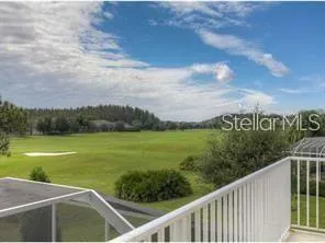 a view of a balcony with ocean view