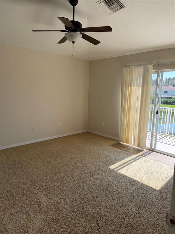 10760 Plantation Bay Drive Tampa, FL 33647 - Photo 19 of 39 a view of an empty room with a window