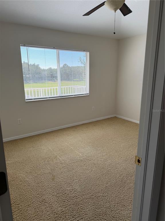 10760 Plantation Bay Drive Tampa, FL 33647 - Photo 27 of 39 an empty room with a window