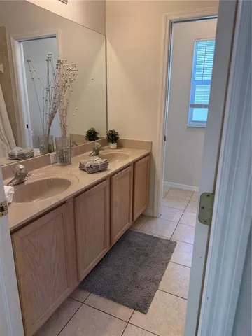 an empty room with windows and entryway