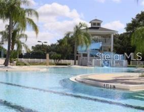 10760 Plantation Bay Drive Tampa, FL 33647 - Photo 37 of 39 a view of a swimming pool with a patio