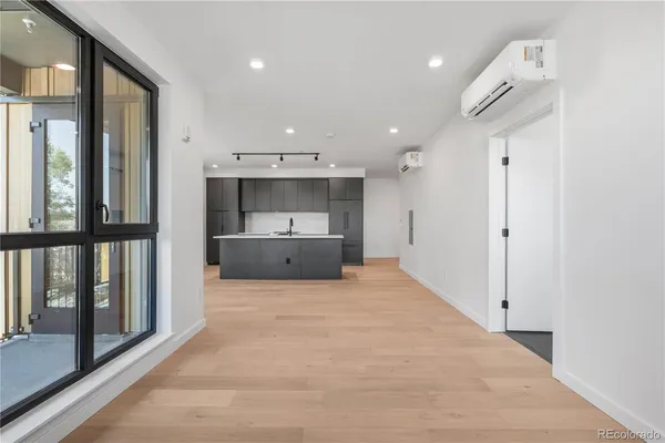 a view of kitchen and windows