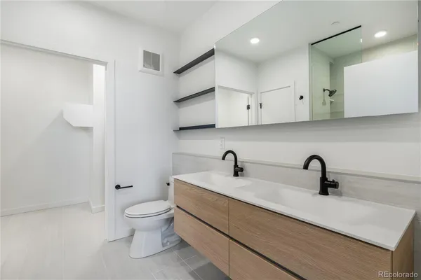 a bathroom with a sink and a toilet