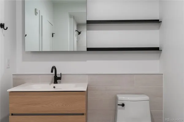a bathroom with a sink and a toilet