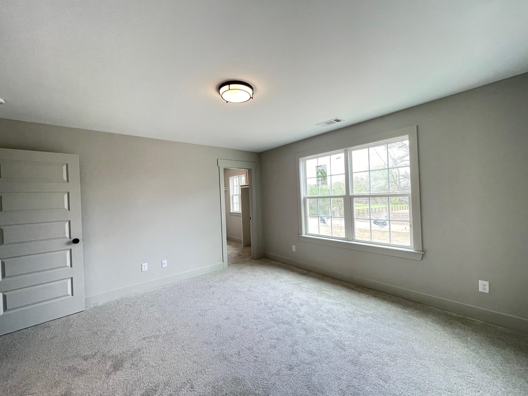 11150 Shelby Post Road Collierville, TN 38017 - Photo 10 of 25 an empty room with a window
