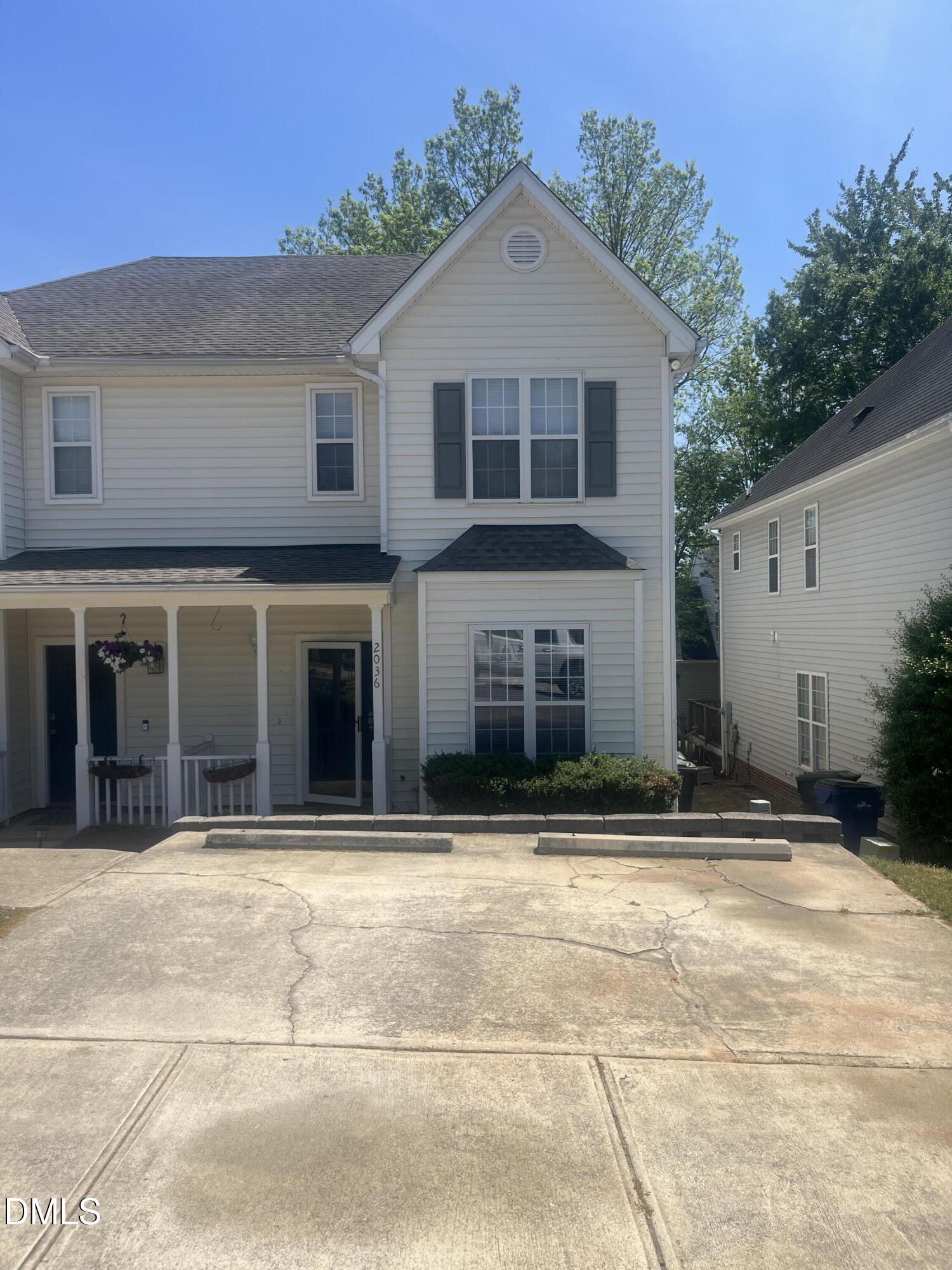 a front view of a house with a garage