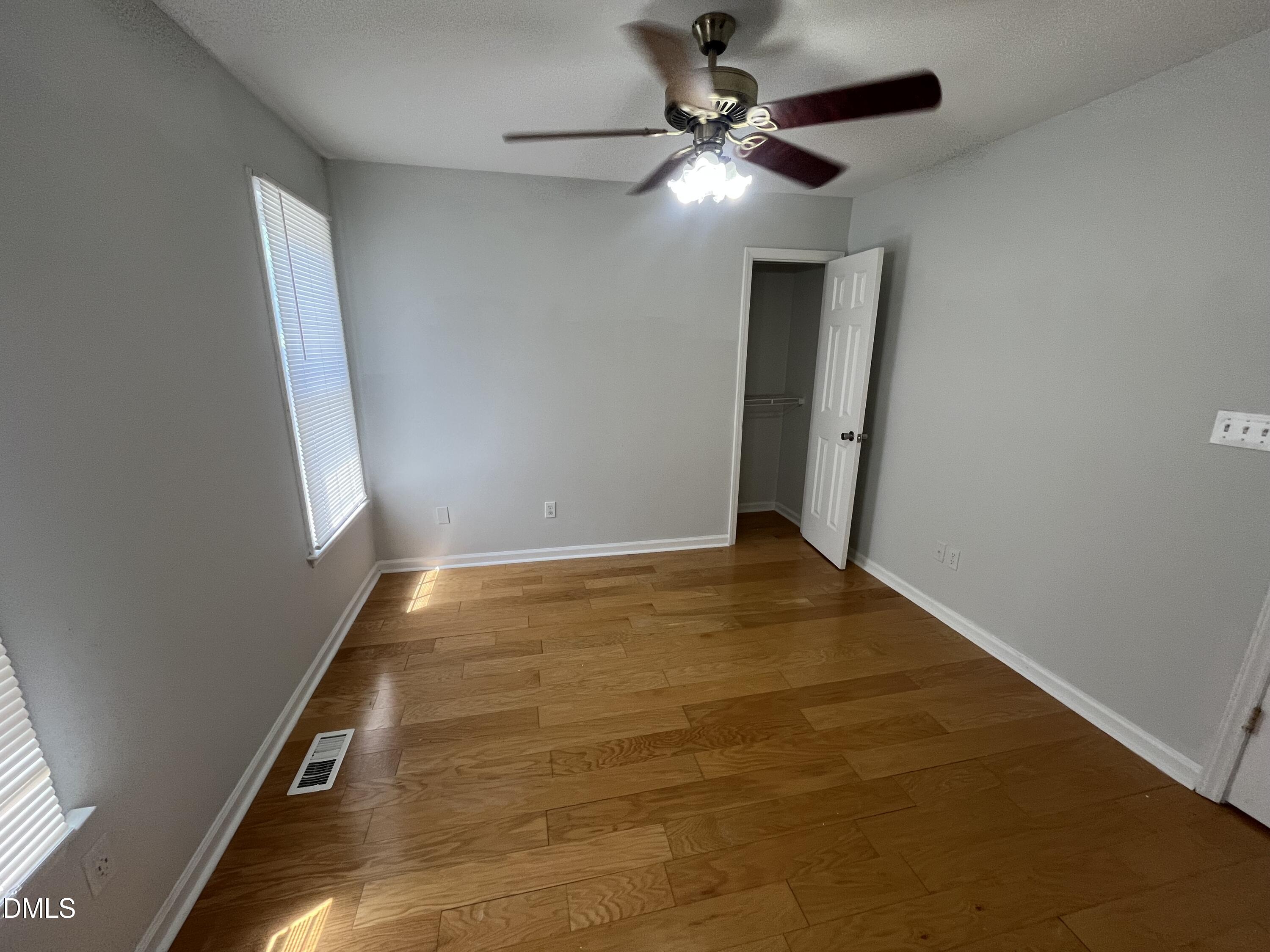 2036 Turtle Point Drive Raleigh, NC 27604 - Photo 13 of 29 an empty room with a chandelier fan and entryway