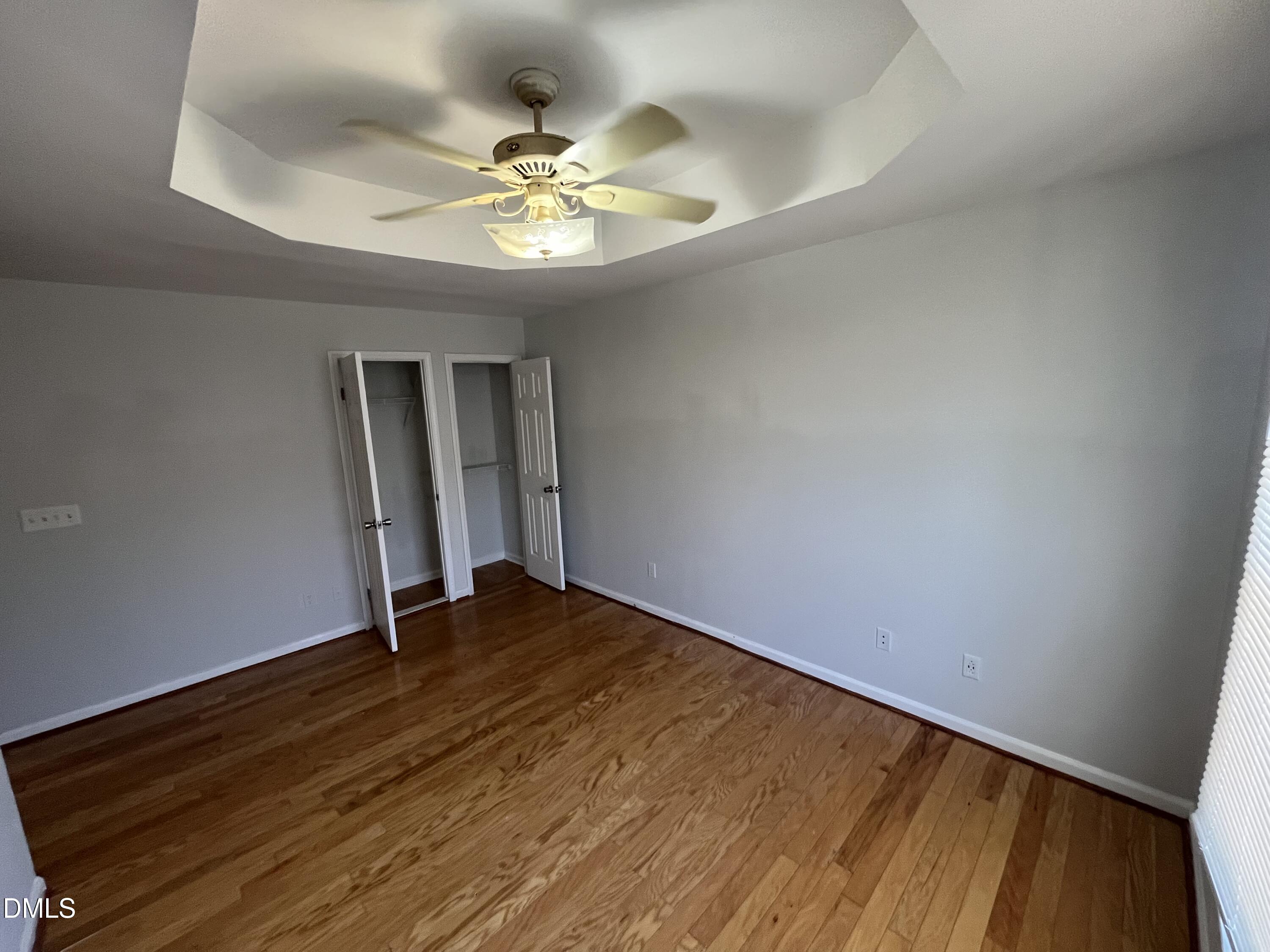 2036 Turtle Point Drive Raleigh, NC 27604 - Photo 16 of 29 a view of an empty room with wooden floor
