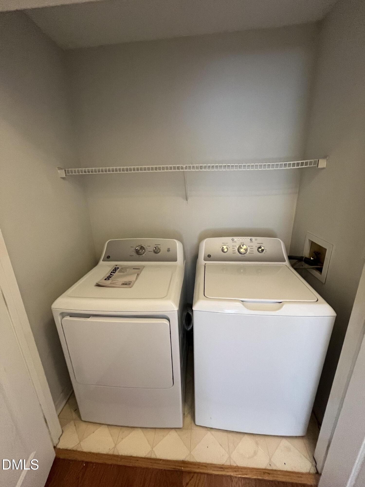 2036 Turtle Point Drive Raleigh, NC 27604 - Photo 10 of 29 a utility room with dryer and washer