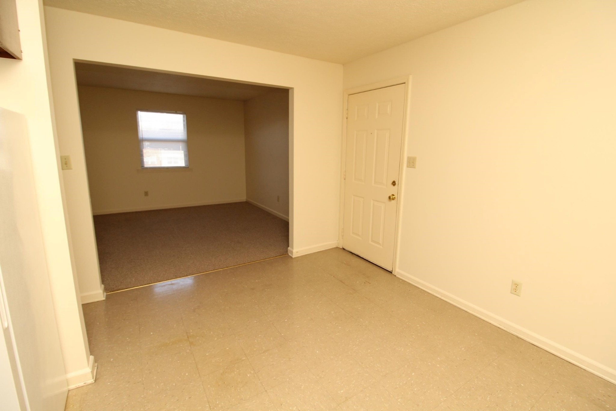 2830 Greenville Road, Unit C2 Hopkinsville, KY 42240 - Photo 2 of 10 a view of an empty room with a window