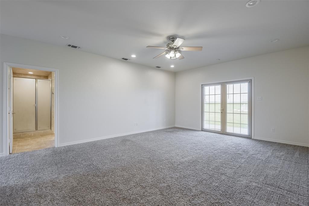 1066 W Road Waxahachie, TX 75165 - Photo 17 of 36 a view of an empty room with a window