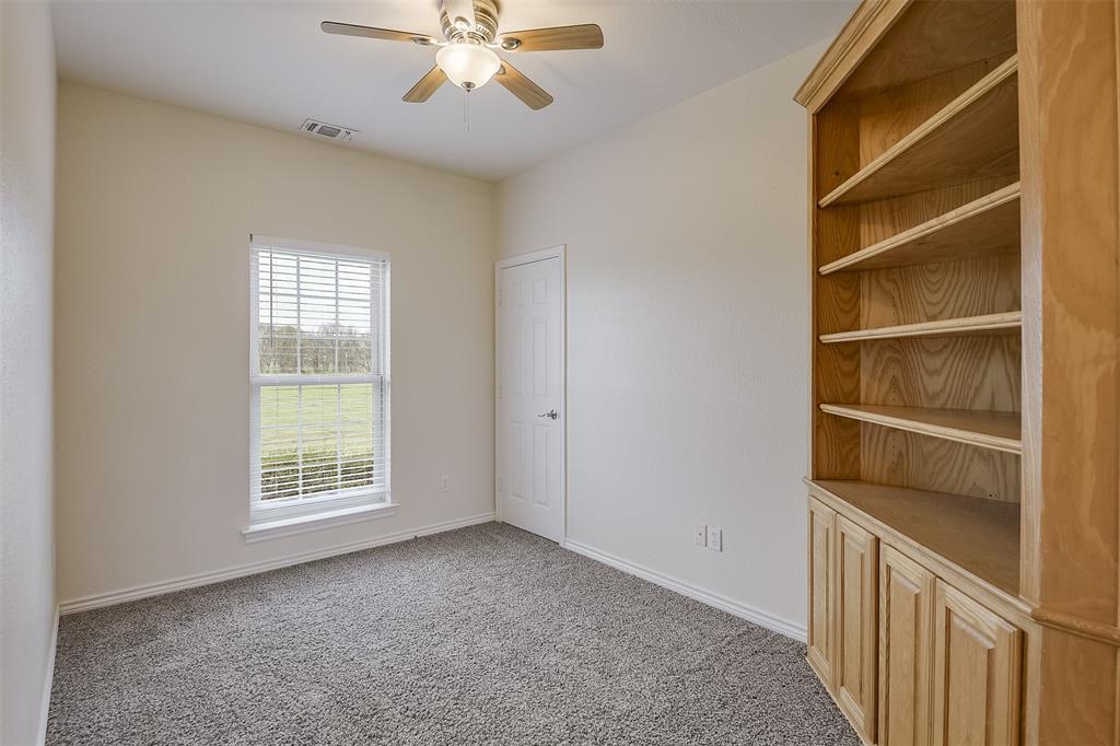 1066 W Road Waxahachie, TX 75165 - Photo 20 of 36 a view of an empty room with a window