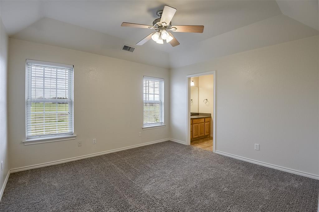 1066 W Road Waxahachie, TX 75165 - Photo 23 of 36 a view of an empty room with a window