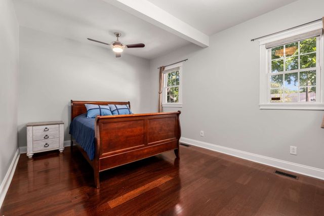 a room with furniture and a window