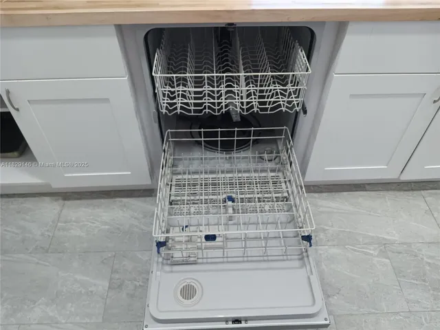 a kitchen with a stove and a refrigerator