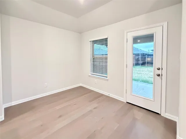 an empty room with window