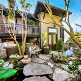 a view of a chairs and table in a patio