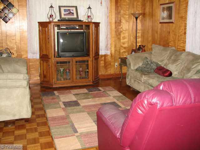 1632 Garner Road Denton, NC 27239 - Photo 10 of 15 Den/Family/Great Room. Would be dining room, used as den/TV room.