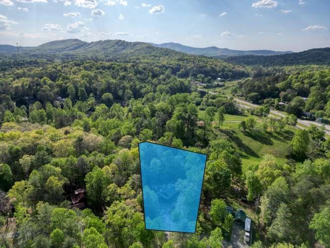 130 Coopers Ridge Road Murphy, NC 28906 - Photo 28 of 32 an aerial view of a house with a yard
